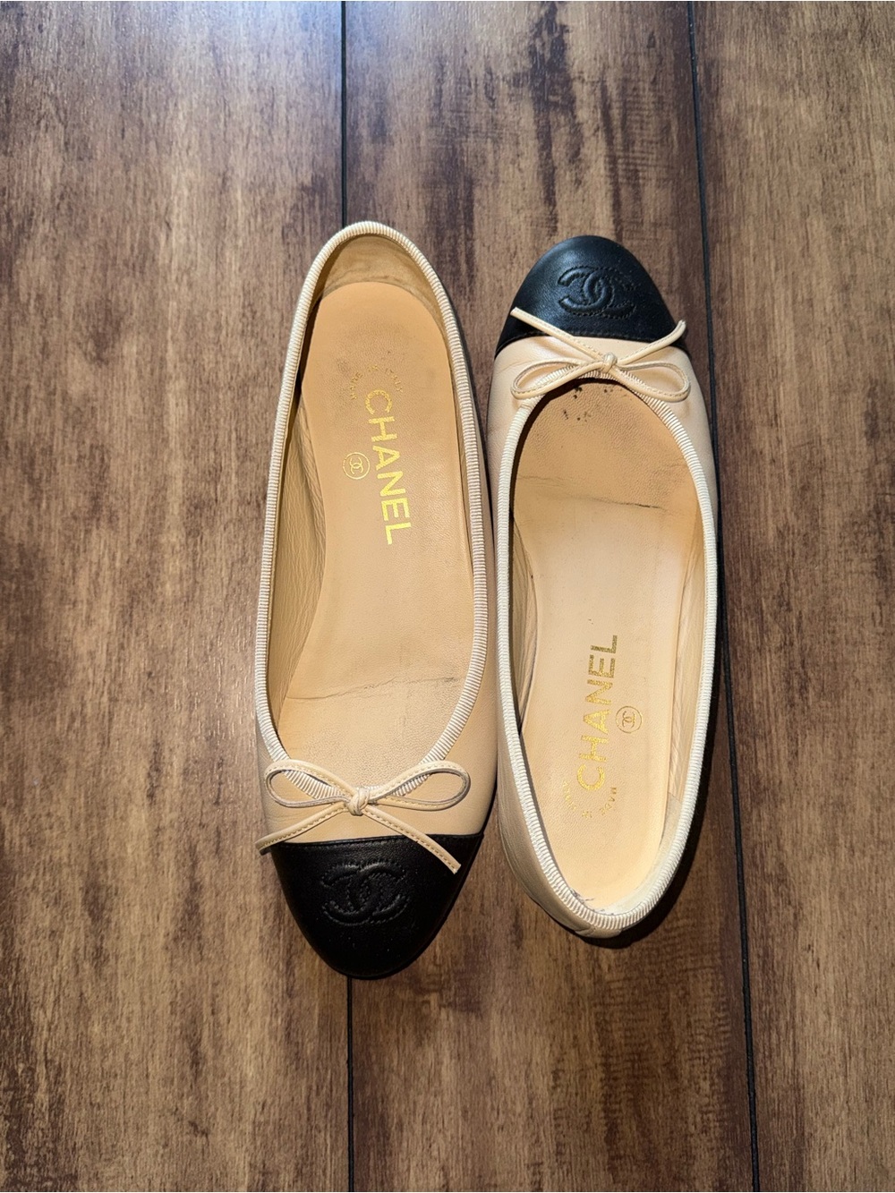 CHANEL Beige Leather Ballet Flats with Black Cap Toe
